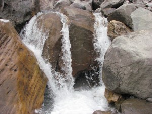 stone in splashing river